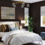 white bed linen and blue chairs